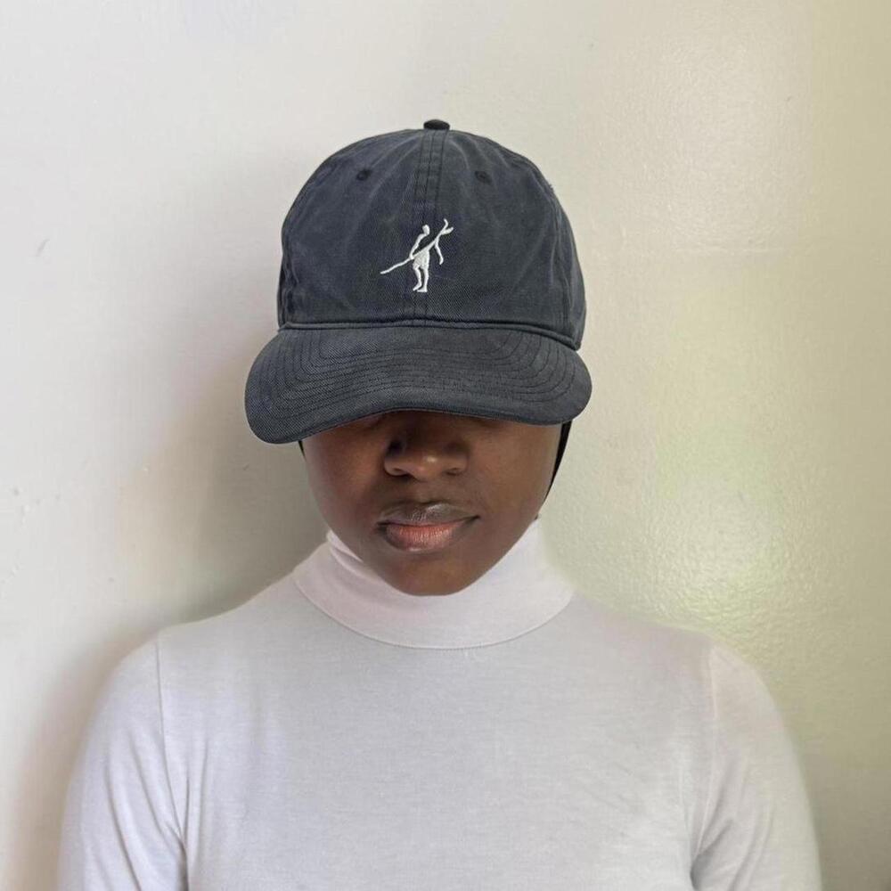 Vintage black faded adjustable baseball‎ cap with white logo
